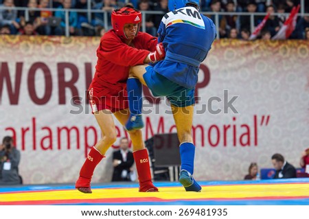 RUSSIA, MOSCOW - MARCH 27: Kanzhanov B. (Red) vs Umbayev N. (Blue) on World Sambo Championship Kharlampiev memorial in Luzhniki sport palace, Moscow, Russia, 2015