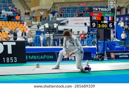 MOSCOW, RUSSIA - MAY 31 2015: Flora Palu get injured during the World  fencing Grand Prix Moscow Saber in Luzhniki sport palace