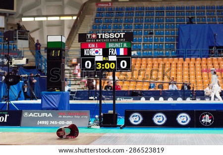 MOSCOW, RUSSIA - MAY 31 2015: Jiyeon Kim and Manon Brunet score board on the World  fencing Grand Prix Moscow Saber in Luzhniki sport palace