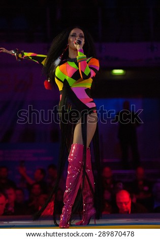RUSSIA, MOSCOW - APRIL 18 2015: Anastasia Lyubimova sings a song on World Hand to hand combat Championship in Moscow, Russia, 2015