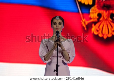 RUSSIA, MOSCOW - APRIL 18 2015: Singer Sati Kazanova sing a song on World Hand to hand combat Championship in Moscow, Russia, 2015