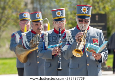 RUSSIA, ROSTOV CITY - MAY 9: Unidentified orchestra musicians walk on Victory day parade dedicated 70 anniversary of WWII end on May 9, 2015, Rostov the Great city, Russia