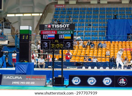 MOSCOW, RUSSIA - MAY 31 2015: A. Komashuk and E. Karbolina score board on the World  fencing Grand Prix Moscow Saber in Luzhniki sport palace