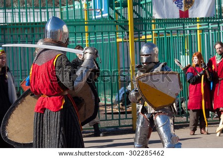 RUSSIA, MOSCOW - MARCH 14: Unidentified knights fight on tournament on history reenactment of the Medieval maneuvers in Moscow, 14 March, 2015, Russia