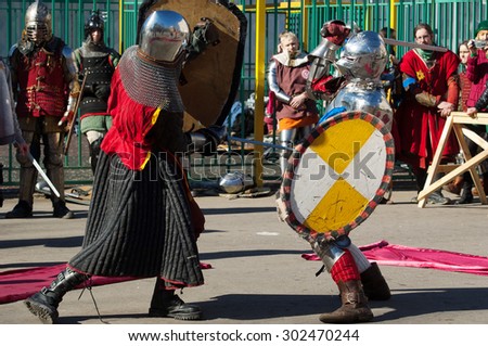 RUSSIA, MOSCOW - MARCH 14: Unidentified knights fight on tournament on history reenactment of the Medieval maneuvers in Moscow, 14 March, 2015, Russia