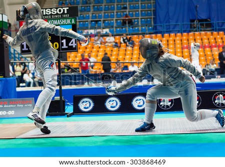 MOSCOW, RUSSIA - MAY 31 2015: A. Komashuk versus E. Karbolina on the World  fencing Grand Prix Moscow Saber in Luzhniki sport palace