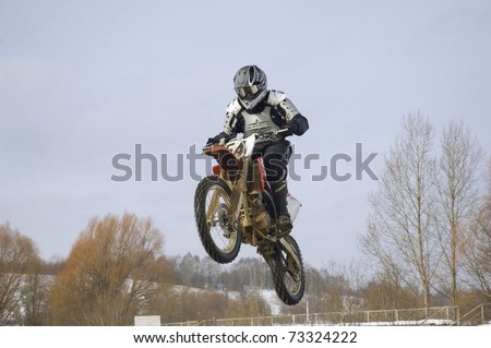 MOSCOW - FEBRUARY 28: Unrecognized sportsman on a second tour of motocross of Red Racing Group club on February 28, 2010 in Moscow, Krilatskoe, Russia