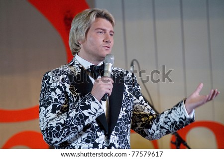 MOSCOW - MARCH 5: Russian singer Nikolay Baskov at a concert dedicated to the International Women\'s Day in Supreme Court of Russian Federation on March 5, 2011 in Moscow, Russia