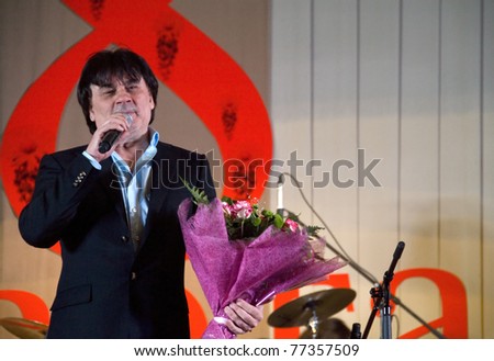 MOSCOW - MARCH 5: Russian singer Alexander Serov on a concert dedicated to the International Women\'s Day at Supreme Court of Russian Federation on March 5, 2011 in Moscow, Russia