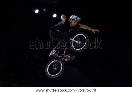 MOSCOW, RUSSIA - FEBRUARY 11: Unidentified bike trial rider competes at the festival of Extremals sports at Lugniki on February 11, 2012 in Moscow, Russia