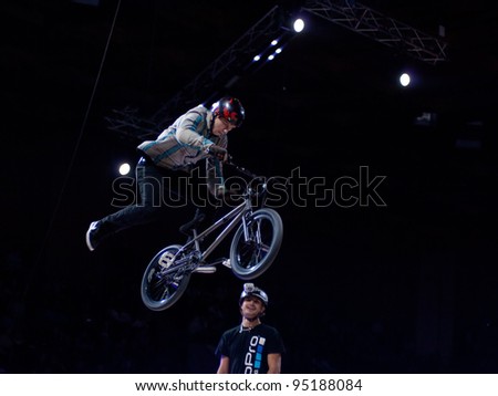 MOSCOW, RUSSIA - FEBRUARY 11: Unidentified bike trial rider competes at the festival of Extremals sports at Lugniki on February 11, 2012 in Moscow, Russiasia