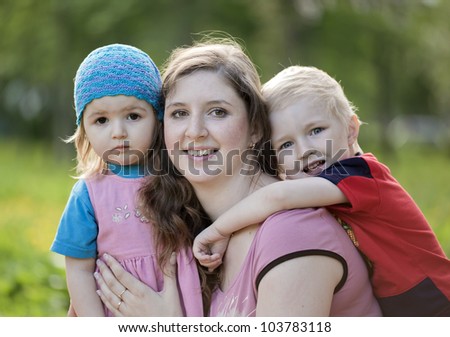 The young woman and two children