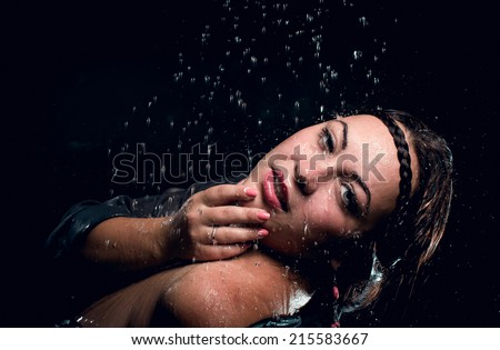 The young woman under drops