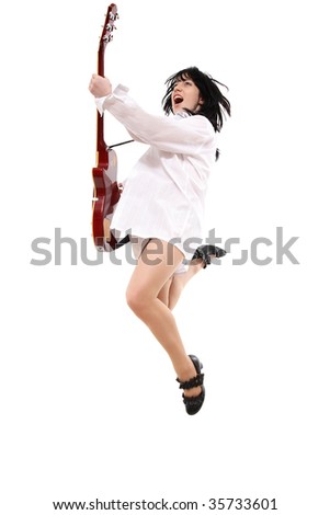 The girl jumps with a guitar and shouts
