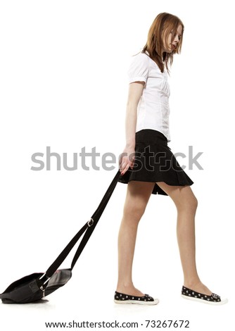 The sad girl drags a bag on a white background