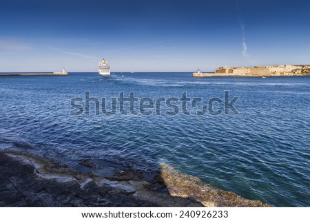 Big ship at the harbor gate in Malta