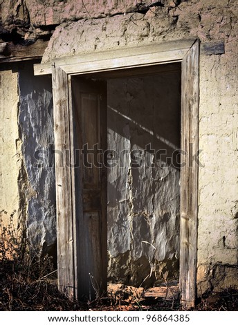 Old abandoned door frame of on old underground house in Hungary