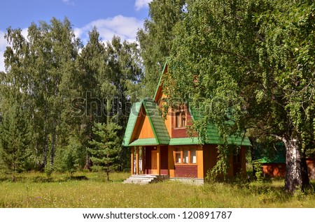 Traditional russian rural wooden house in forest