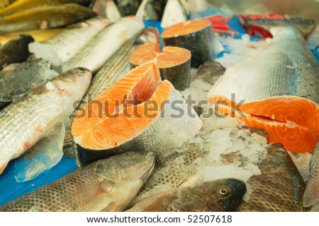 Fresh fish for sale on a market stand
