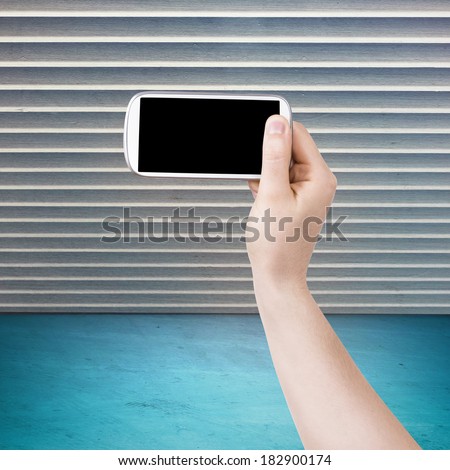 isolated woman hand holding the phone tablet touch computer gadget