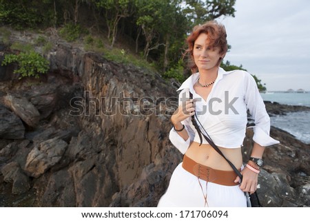 The red-haired girl in desert island