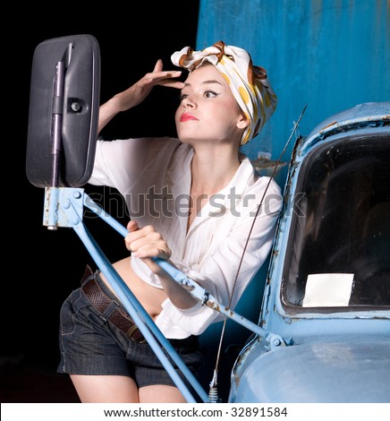 stock photo portrait pinup young woman from the car