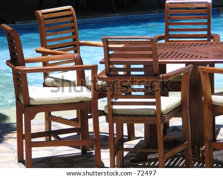 Furniture by the pool at a resort (closeup)