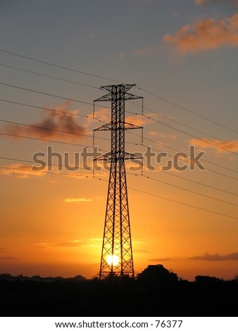 Power supply pylon over a sunset