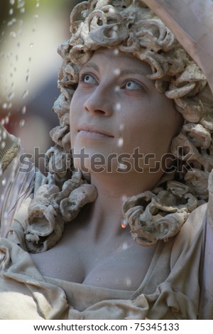 TAMPA, FLORIDA - APRIL 09: A woman  dressed up in costume to entertain the crowds during the 2011 Renaissance  Festival on April 19, 2011 in Tampa, Florida.