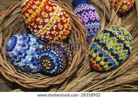 Easter eggs from beads and basket from dry stalk
