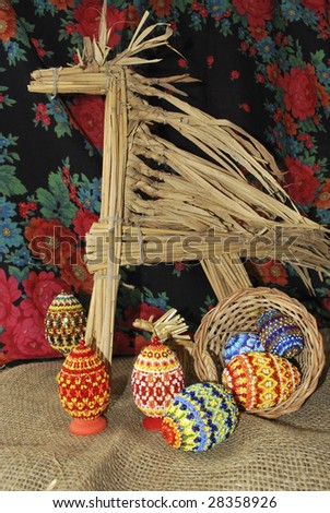 Easter eggs from beads and toy horse from dry stalk