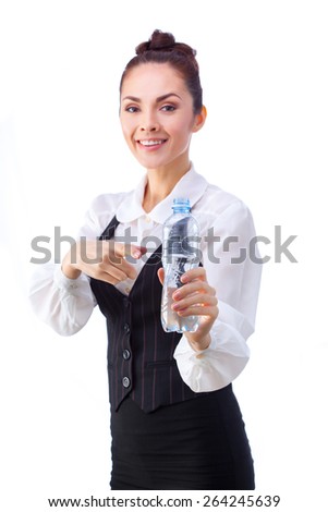 Successful caucasian businesswoman  having a break with fresh water. This photo has been produced with these professionals : make-up artist, hair dresser and stylist. A professional retoucher gave it