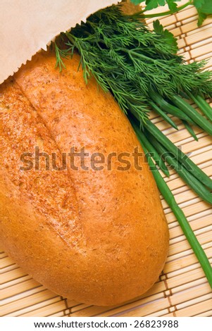 Bread with greens in a package closeup