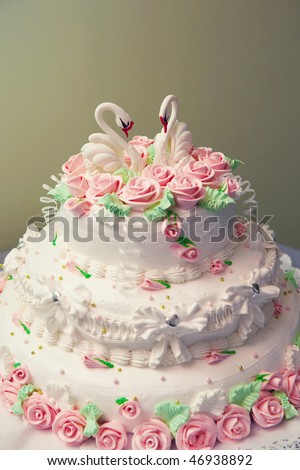 stock photo Wedding cake decorated with flowers and birds