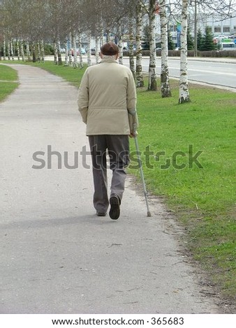 old man walking on the street