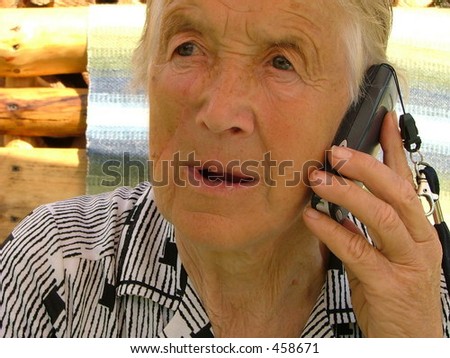 grandmother talking with a mobile phone