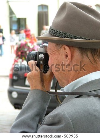 old gentleman taking a picture