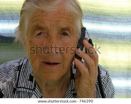 grandmother talking with a mobile phone