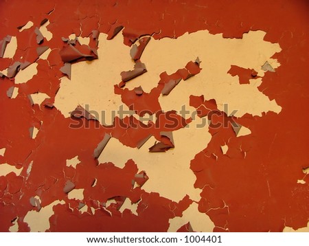 red paint peeling off the wall
