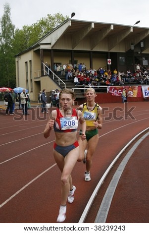 TARTU, ESTONIA - MAY 20: Athletes running along the track and taking part in Student Sell Games, organized by Estonian Academic Sports Federation in May 20, 2006.