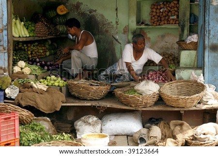 AGRA, INDIA - JUNE 17: Market. Most common health risks in India are hep B and typhoid, the main source being contaminated unclean food, same as sold on this market on June 17, 2007 in Agra, India.
