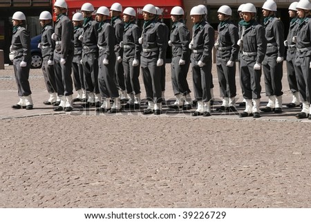 HELSINKI, FINLAND – JUNE 1: Young recruits full uniform and battle gear get ready for military parade on June 1, 2007 in Helsinki.