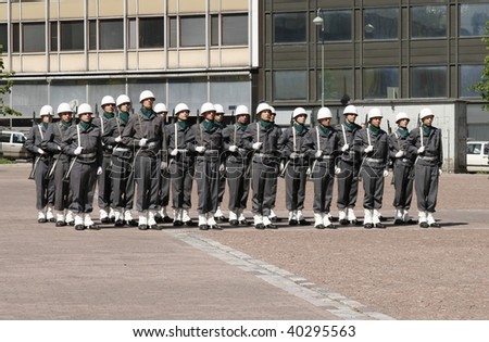 HELSINKI, FINLAND - JUNE 1: A small military parade in the central city. Young recruits were marching through the city in full uniform and battle gear on June 1, 2007 in Helsinki, Finland.