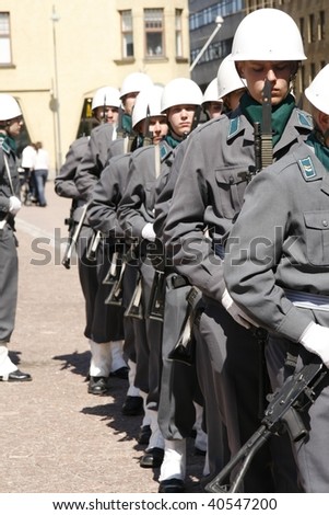 HELSINKI, FINLAND - JUNE 1: A small military parade in the central city. Young recruits were marching through the city in full uniform and battle gear on June 1, 2007 in Helsinki, Finland.