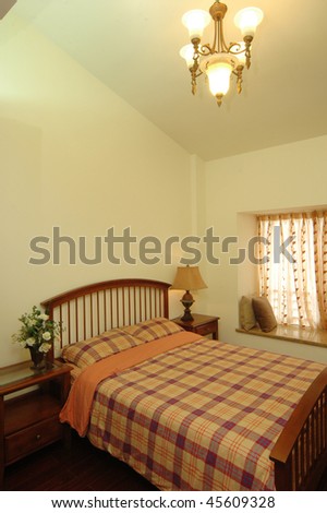 a bedroom with simple double bed