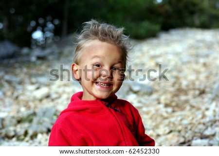 Little child with smile and hair as a devil