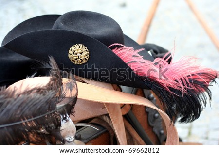 Musketeer\'s black hat with long feather