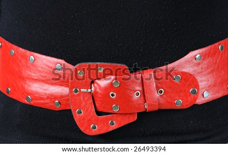 red belt in black dress