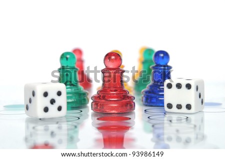Ludo game with multicolored glass figures