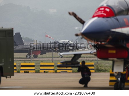 ZHUHAI, CHINA - NOV. 10. 2014:A J-31 stealth fighter of Chinese People\'s Liberation Army Air Force is seen during a test flight ahead of the 10th China International Aviation and Aerospace Exhibition.